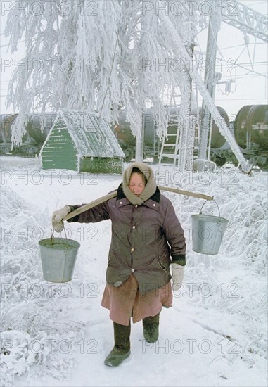 A view in one of the settlements in kamyshino district of volgograd region, electric power supply of over 50 settlements was disrupted because of multiple damage of power lines in the area caused by ice mounds on wires, volgograd region, russia, january 9,2004.