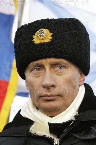Russian president vladimir putin seen aboard the heavy missile-carrying submarine cruiser arkhangelsk from where he watched large scale exercises in the barents sea, severomorsk, russia, february 17,2004.