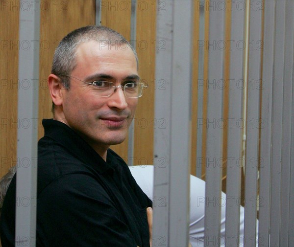 Mikhail khodorkovsky former boss of yukos oil company before the start of the court hearing, khodorkovsky and and his business partner, main yukos shareholder platon lebedev are charged with fraud and tax evasion, moscow, russia, july 16, 2004.
