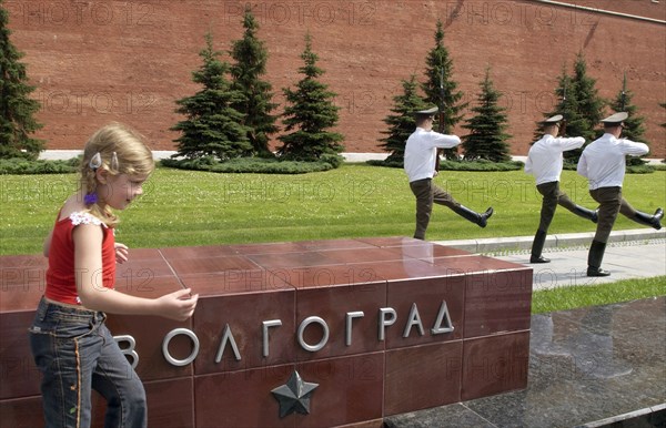 The tomb of the unknown soldier memorial in alexandrovsky garden near the kremlin wall, moscow, russia, 07/ 04, president putin ordered the word 'volgograd' replaced by 'stalingrad' on the black memorial stone.