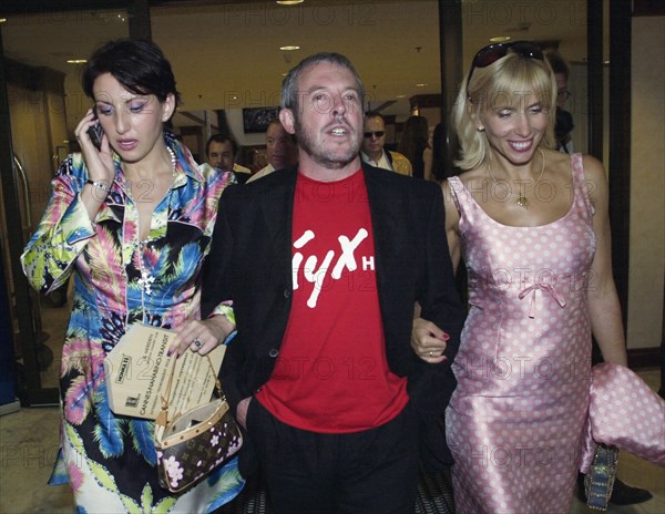 (l-r) pop-singers alika smekhova, andrei makarevich amd alyona sviridova performed at the party to mark the 9th anniversary of radio station 'silver rain' moscow, russia, august 6, 2004.