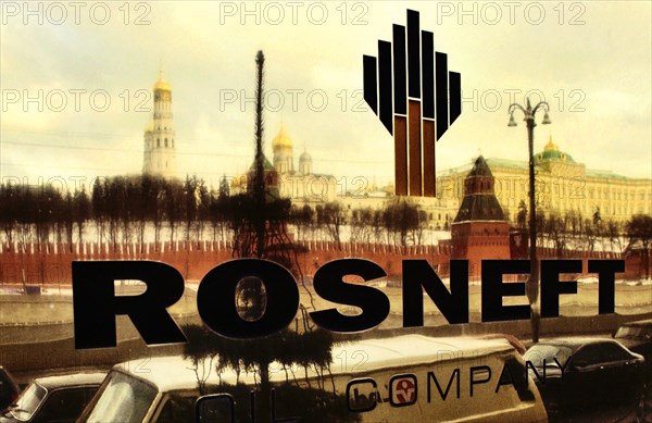 Moscow landmark buildings reflected in plaque outside headquarters of rosneft state oil company, moscow, russia, 12/04, controlling block of shares of jsc yuganskneftegaz now belongs to rosneft.