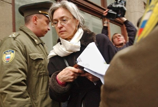 Journalist and human rights advocate, anna politkovskaya appears outside the waiting room of the presidential administration where a protest action 'under siege-2: empty space' was held, the action was staged by parents of national bolshevik party activists arrested on december 14, 2004 for symbolical 'seizure' of the waiting room of the presidential administration, april 19, 2005.