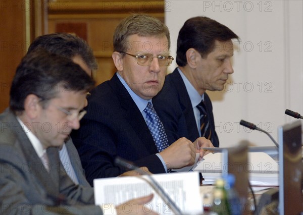L to r: health and social development minister mikhail zurabov, russian minister of finance alexei kudrin (center) and deputy prime minister alexander zhukov attend a sitting of the russian cabinet on june 2, 2005.