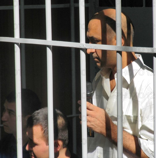 Tashkent, uzbekistan, rebels involved in mass disturbances in andizhan in may, 2005 appear in the supreme court of uzbekistan, the court found them guilty of terrorism, an attempted coup d'etat and unlawful takeover of administrative buildings, defendants awaiting trial session.