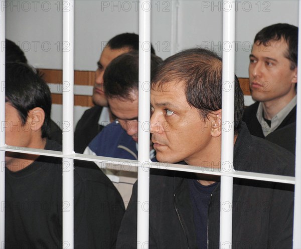 Tashkent, uzbekistan, rebels involved in mass disturbances in andizhan in may, 2005 appear in the supreme court of uzbekistan, the court found them guilty of terrorism, an attempted coup d'etat and unlawful takeover of administrative buildings, they were sentenced to prison terms ranging from five to twenty years.