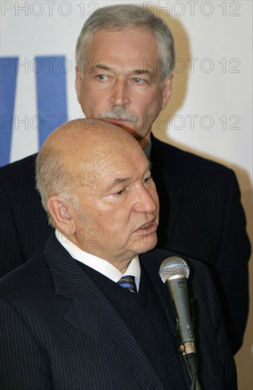 Moscow mayor yuri luzhkov (front) speaks as leader of the united russia party boris gryzlov listens during a press conference dedicated to the outcome of the 6th united russia party congress in krasnoyarsk, russia, november 26, 2005.