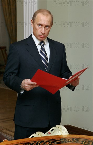 Russian president vladimir putin is pictured prior to a meeting of security council members in novo-ogaryovo, moscow region, russia, december 2005.