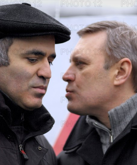 Head of the united civil front, garry kasparov, left, and leader of the russian people's democratic union mikhail kasyanov seen during an opposition protest rally dubbed the 'march of those who disagree' in triumfalnaya square, central moscow, december 17, 2006.