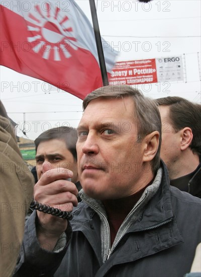 Leader of the russian people's democratic union mikhail kasyanov speaks into a megaphone at an opposition rally “the march of those who disagree” in support of the yabloko party, march 4,2007, moscow, russia.