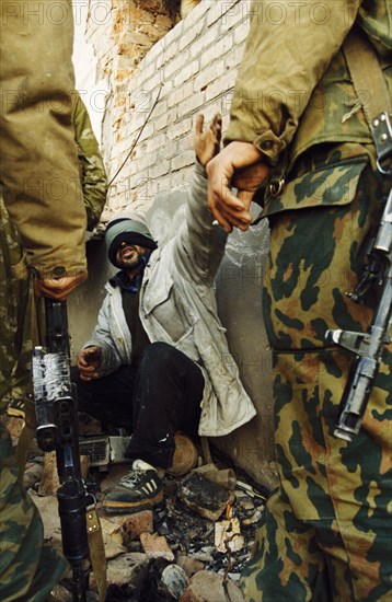 Second chechen war, a chechen rebel captured by russian federation troops in grozny, chechnya, january 2000.