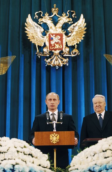 Inaugeration of vladimir putin as the new president of the russian federation at the st, andrew hall of the grand kremlin palace in moscow as former president boris yeltsin looks on, may 7, 2000.