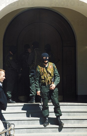 Moscow, russia, may 11, 2000, masked tax police officers during searches of the offices of the media-most holding company, may 31, 2000, moscow, russia, the searches are part of the investigation of vladimir gusinsky, the head of the company.