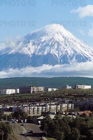 The city of petropavlovsk with koryak volcano (3,464 meters) in the background, kamchatka, siberia, russia.
