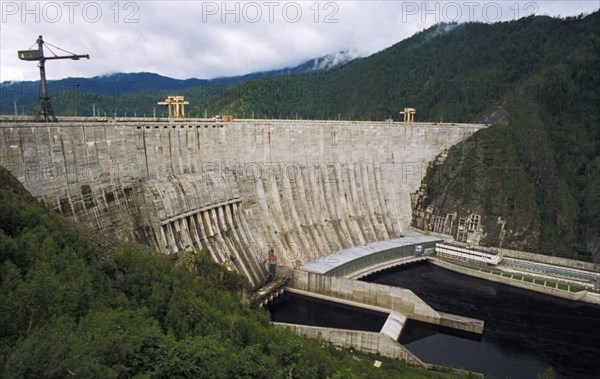 He sayano-shushenskaya dam and hydroelectric power station on the yenisey river in the republic of khakassia, russia, at full capacity, it's the world's biggest power generator.