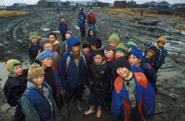 Children of reindeer breeders of the taymyr peninsula in siberia waiting to be airlifted by helicopter to a boarding school in nosok for the winter, 1998.