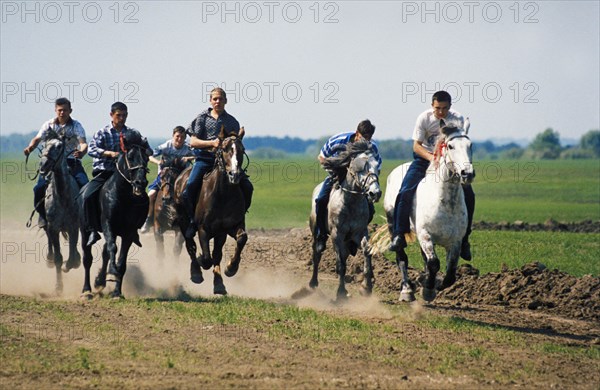 Traditional horse racing during sabantuy, the main tatar national holiday, tatarstan, russia.