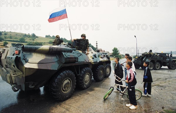 Russian peacekeeping troops arriving in the us/nato controlled area of kosovo in former yugoslavia, june 1999.