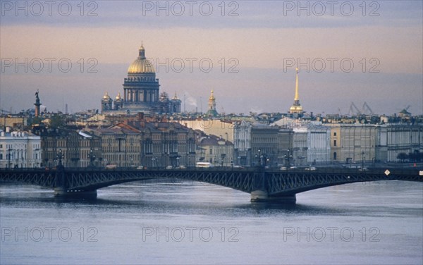 Bridge crossing the neva river in st, petersburg, russia, the dome of st, isaac's cathedral is in the background, 2003.