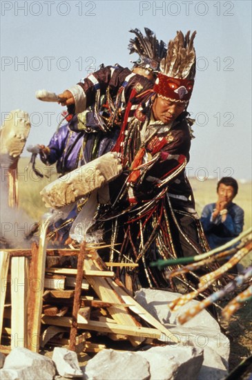 A tuvan shaman communing with spirits, tuva, russia.