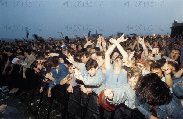 A crowd of fans at an outdoor rock festival in moscow, russia, early 1990s.