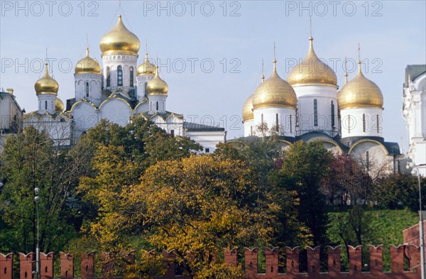 Onion-domed churches of the moscow kremlin seen from the kremlin embankment, october 2003.