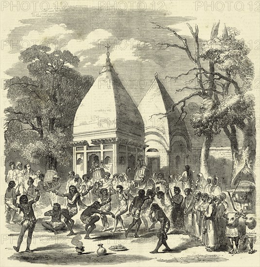 Hindoo hindu  dance  Festival dancers and musicians celebrating in front of a temple