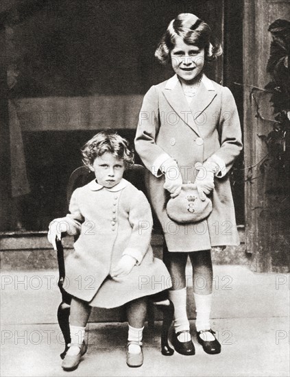 Princess Elizabeth of York and her younger sister Princess Margaret with gifts presented to them by members of the Disabled Soldier's Embroidery Society in 1933