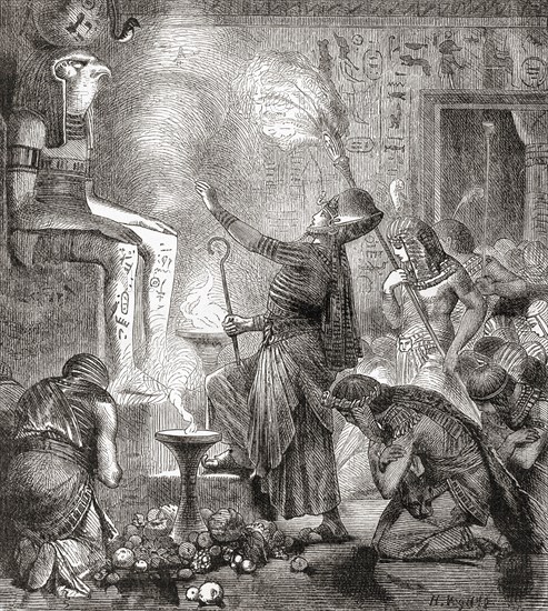 An Egyptian king worshipping the God Horus in a temple