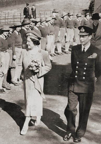George VI and Queen Elizabeth inspecting members of the Women's Land Army in 1942 during WWII