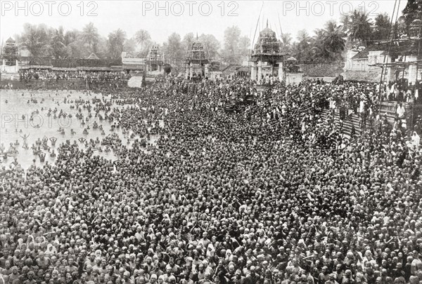 Thousands of Hindus bathing in the sacred River Ganges