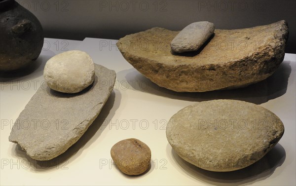 Active and passive grindstones, From back to front: Las Palas Plane (El Almanzora Caves, province of Almeria, Andalusia) and Los Murcielagos Cave (Zuheros, province of Cordoba, Andalusia); Unknown origin and Los Marmoles Cave (Priego, province of Cordoba, Andalusia) and Mejorada del Campo (Community of Madrid, Spain)