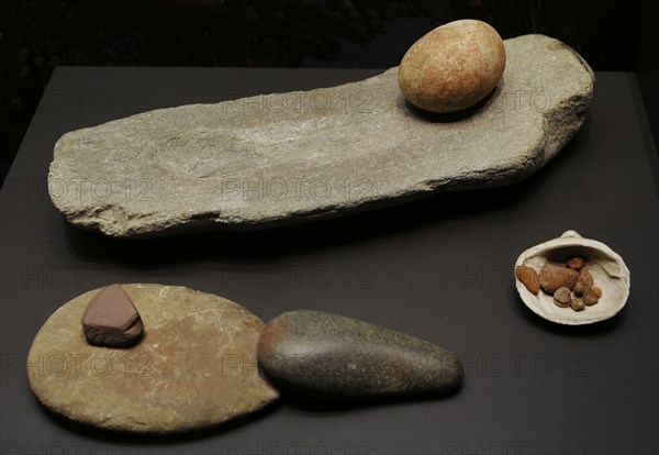 From left to right and from back to front: Grindstone, El Garcel (Antas, Almeria province, Andalusia) and El Higueron Cave (Rincon de la Victoria, Malaga province, Andalusia); Grindstone, pestle and dye