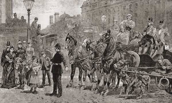 A policeman stops the traffic on a busy crossing to allow pedestrians to cross the road, London, England,