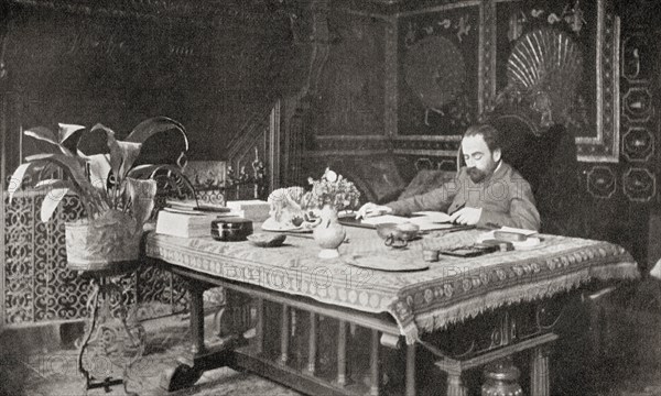 Zola in his study