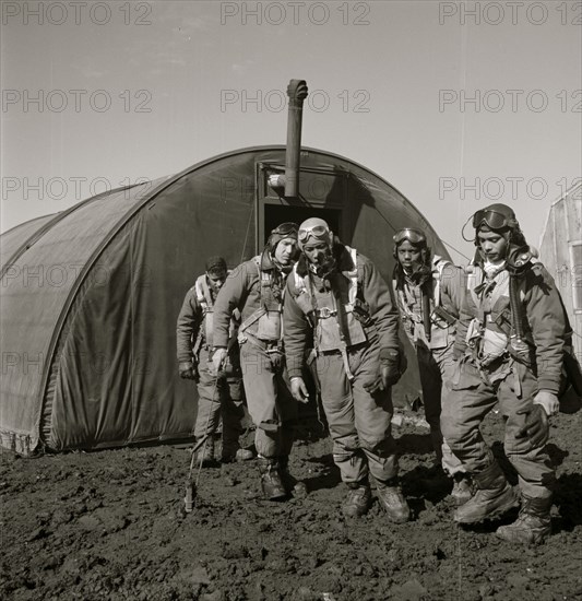 Tuskegee airmen exiting the parachute room, Ramitelli, Italy, March 1945