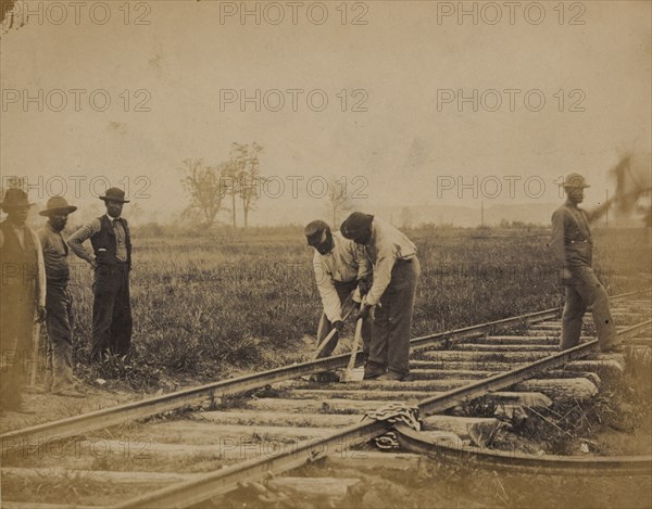 Military railroad operations in northern Virginia: African American laborers working on rail