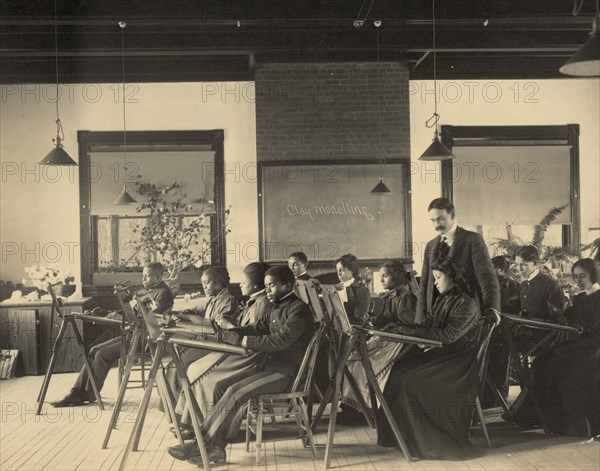 Formal class in liberal arts and sciences Hampton Institute, Hampton, Va. - writing on blackboard reads "clay modeling"