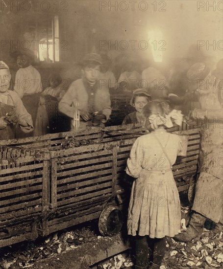 African American Boy works as an Oyster Shucker