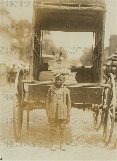 Elwood Palmer Cooper  Helper on miller's wagon.