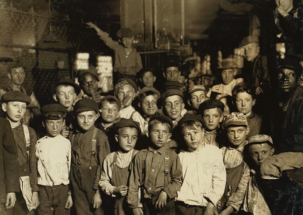 Indianapolis Newsboys waiting for the Base Ball edition, in a Newspaper office.