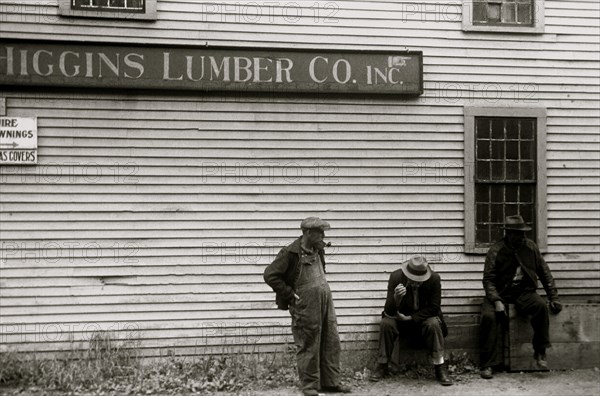 African American sit by the side of  Lumberyard in Provincetown, Mass.