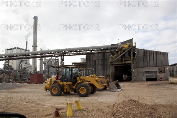 Front End Loader Ready to Load Wood Chips