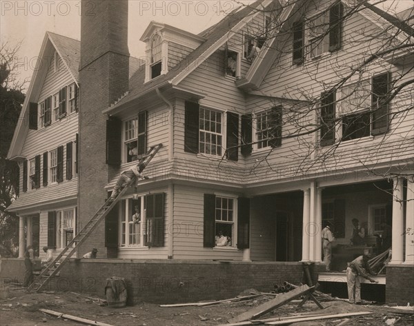 Students at work on a house built largely by them