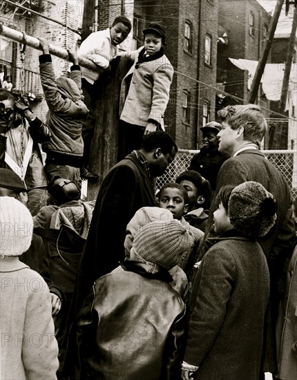 Senator [Robert Kennedy] and CBCC's Donald F. Benjamin join kids at playground