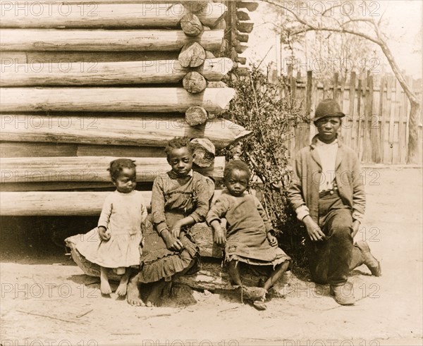 African American man and three children