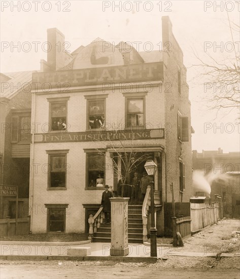 People posed on porch of and in the Planet newspaper publishing house, Richmond, Virginia