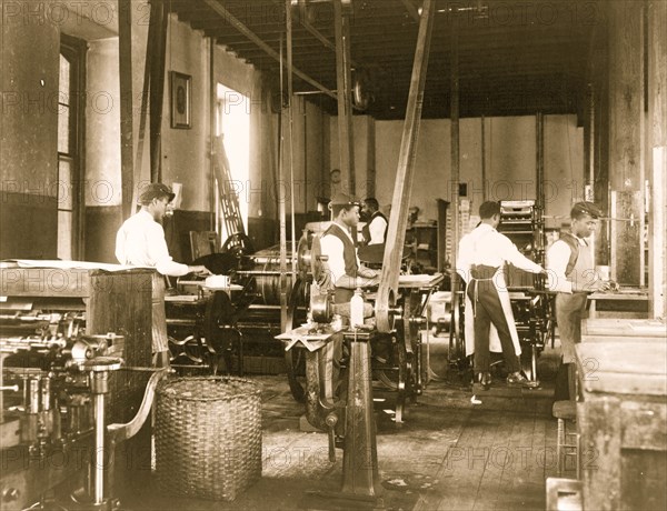 Pressmen at work in printing shop, Hampton Institute