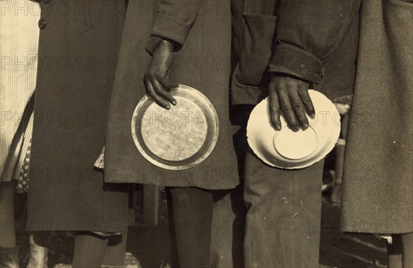 African Americans in the lineup for food in the camp for flood refugees