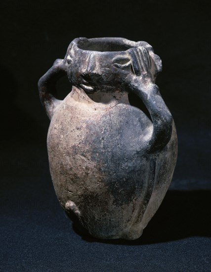 Anthropomorphic ceramic vessel.